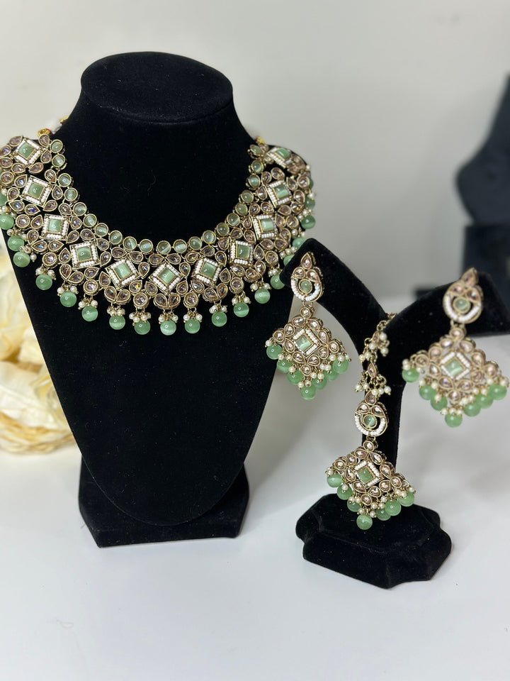 Kajal Reverse AD Gold Plated Necklace Set