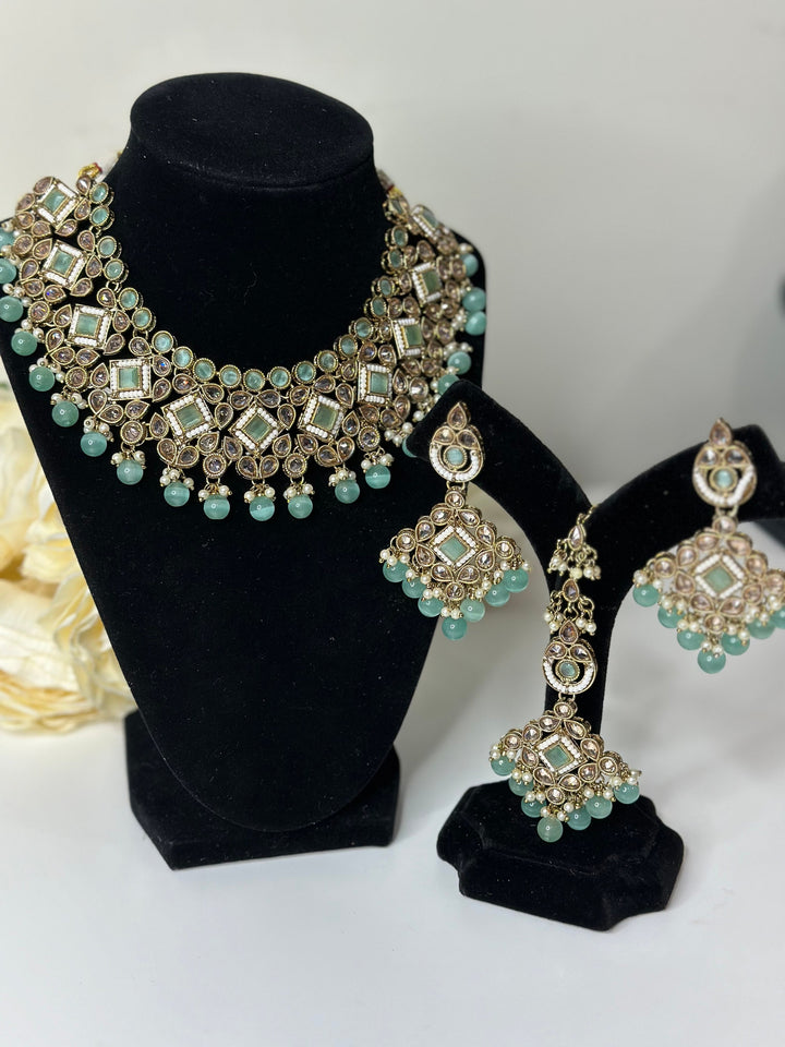 Kajal Reverse AD Gold Plated Necklace Set