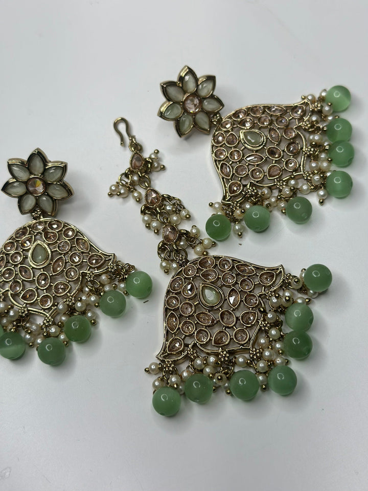Izhaar Indian L. Green Color Polki Reverse AD Necklace with Earrings Tikka/ Wedding Jewelry/ Traditional Jewelry/Wedding/Reverse AD.